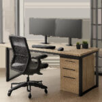 Un bureau en L haut de gamme aménage un angle de pièce avec une organisation claire et une surface de travail généreuse. L’ensemble évoque un espace ergonomique, sobre et adapté au télétravail intensif.